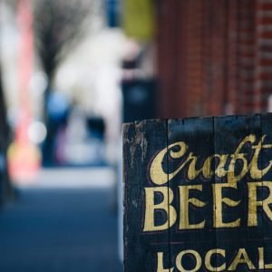 local-craft-beer-advertising-sign-with-golden-lett-WCF48M8